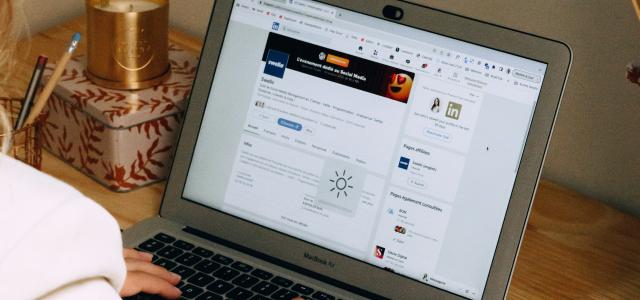 a man using a laptop by Swello courtesy of Unsplash.