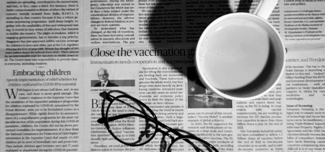 a cup of coffee and a pair of glasses on a newspaper by Ashni courtesy of Unsplash.