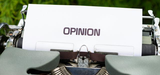 white and black typewriter on green grass during daytime by Markus Winkler courtesy of Unsplash.
